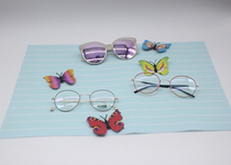 Optician shop counter decoration props bright butterfly glasses shooting background ornaments counter ornaments