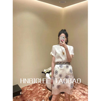 HNBIGLEE Simple high-grade embossed shell light sense silk Camellia short-sleeved ladies shirt top~