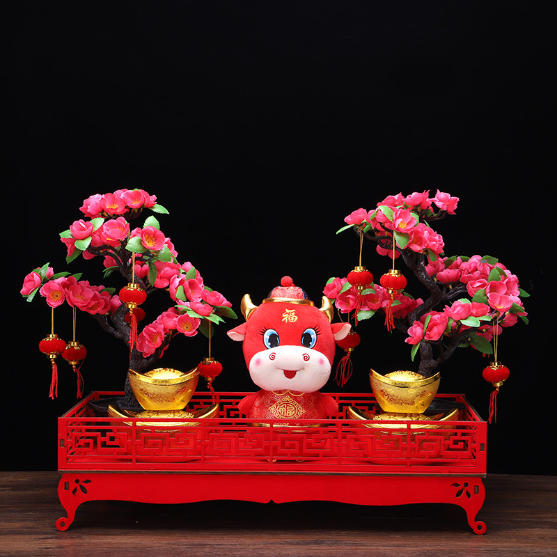 New store opening decoration shopping mall hotel window zodiac ox ornaments jewelry store counter New Year layout peach blossom table