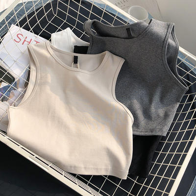 Women wear a sports vest as an outer layer for fitness and dancing. It is a short, high-waisted, crop top with a crop top and sleeveless tops