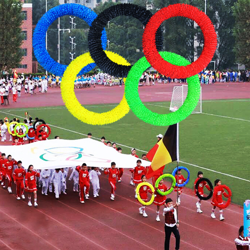 Five rings holding a garland phalanx school games entrance opening ceremony creative honor guard entering the field with props garland