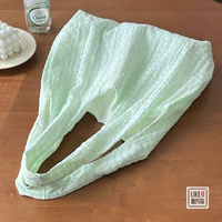 Мешка с зеленым жилетом мяты