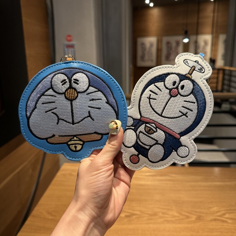 可爱卡通PU刺绣蓝胖子证件套有哪些实用功能和设计亮点?-卡套-淘宝好物网