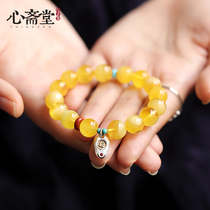 Xin Zhaitang (no fear) natural Baltic beeswax this year Buddha beads jewelry gold twisted Honey Amber bracelet female