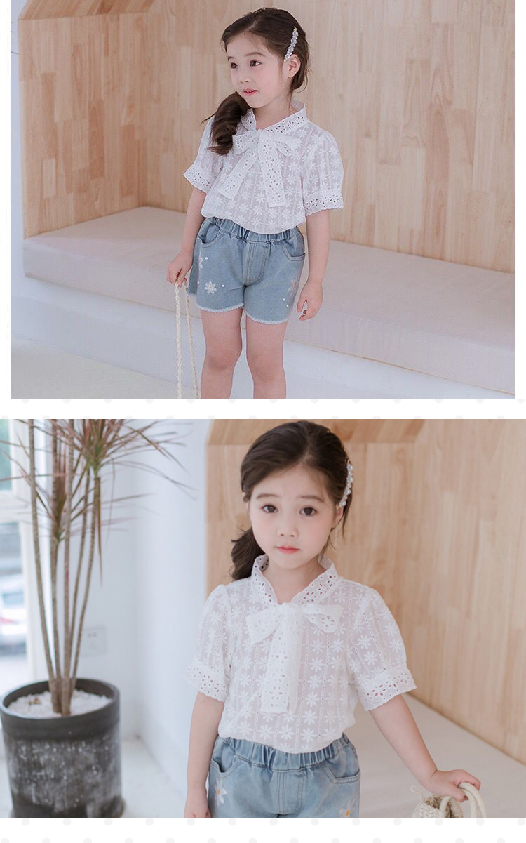 Quần áo trẻ em Hàn Quốc mùa hè cô gái bông hoa rỗng tay áo sơ mi trắng trẻ em áo sơ mi trắng bé sơ mi chạm đáy - Áo sơ mi quần áo trẻ con