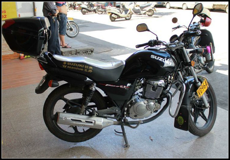 Áp dụng Xijun WH125T-5 Wuyang Honda đệm xe máy bọc da chống nắng cách nhiệt - Đệm xe máy