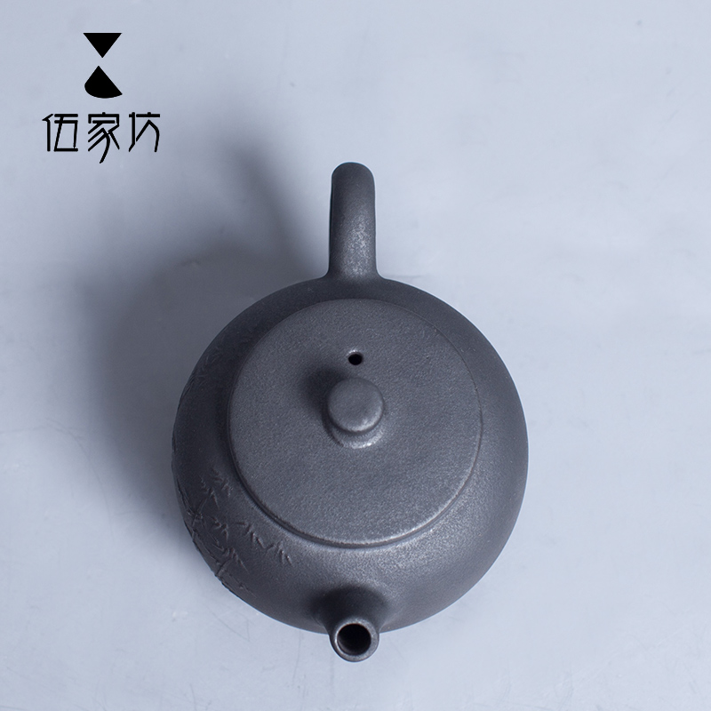The Wu family fang ceramic teapot can raise large teapot filter kung fu tea set single pot of creative hand carve patterns or designs on woodwork