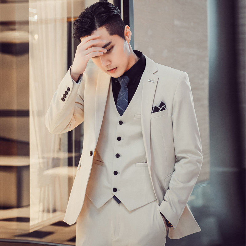 Western-style suit men's three sets of Korean versions of the Inn Wind Shuai Handsome Suit is being loaded with groom and bridegroom to suit the suit