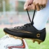 Mới mạ vàng đáy giày bóng đá móng tay dài AG nail nhân tạo sân cỏ chống trượt chân nam và nữ sinh viên màu đỏ và đen - Giày bóng đá