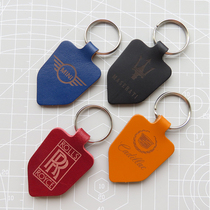 Handmade leather car logo keychain cowhide pendant Car label accessories buckle pendant Literary creative gifts