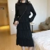 Mùa thu 2018 mới retro nửa cổ cao tay áo kèn tay áo lớp váy cao eo thon váy nữ giữa váy trắng nhún eo	 Váy eo cao