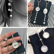 European and American fashion trend brand very fairy white shell star long tassel asymmetrical AB Korean version of the micro-inlaid earrings collection