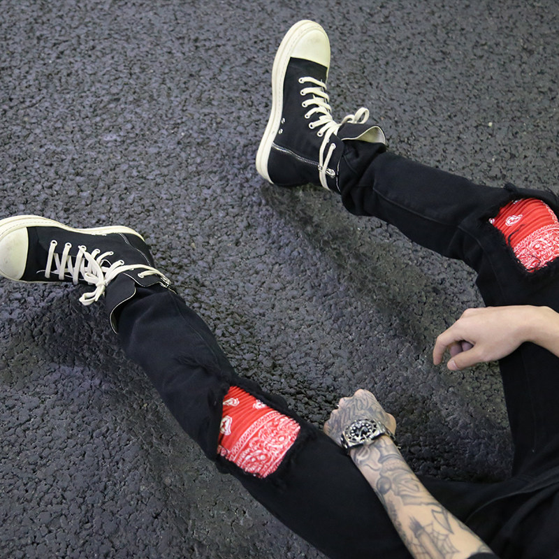 European and American High Street Wind West Coast Cashew Flowers Splicing Patches of Hip Hop Male Hip Hop elastic body black Cowboy smoke pipe pants