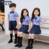 Chơi gấu con ngầu 2019 mới Anh áo sơ mi tay ngắn phù hợp với mẫu giáo quần áo hè học sinh đồng phục học sinh - Đồng phục trường học / tùy chỉnh thực hiện shop đồ trẻ em Đồng phục trường học / tùy chỉnh thực hiện
