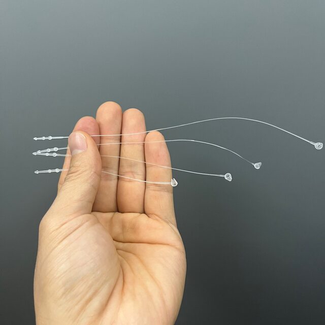 A pack of about 1,000 hair accessories with mother-in-law buckles, zip ties, pointed plastic ropes, fixed ropes and labels