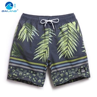 Quần đi biển mùa hè mới của Gailang quần short boxer nam nhanh khô kéo dài kích thước lớn giản dị năm điểm quần bơi có lót 	quần áo cây dừa đi biển