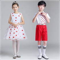 New Years Day children perform choral costumes little girl red scarves middle school students presiding over poetry reciting male performance gowns