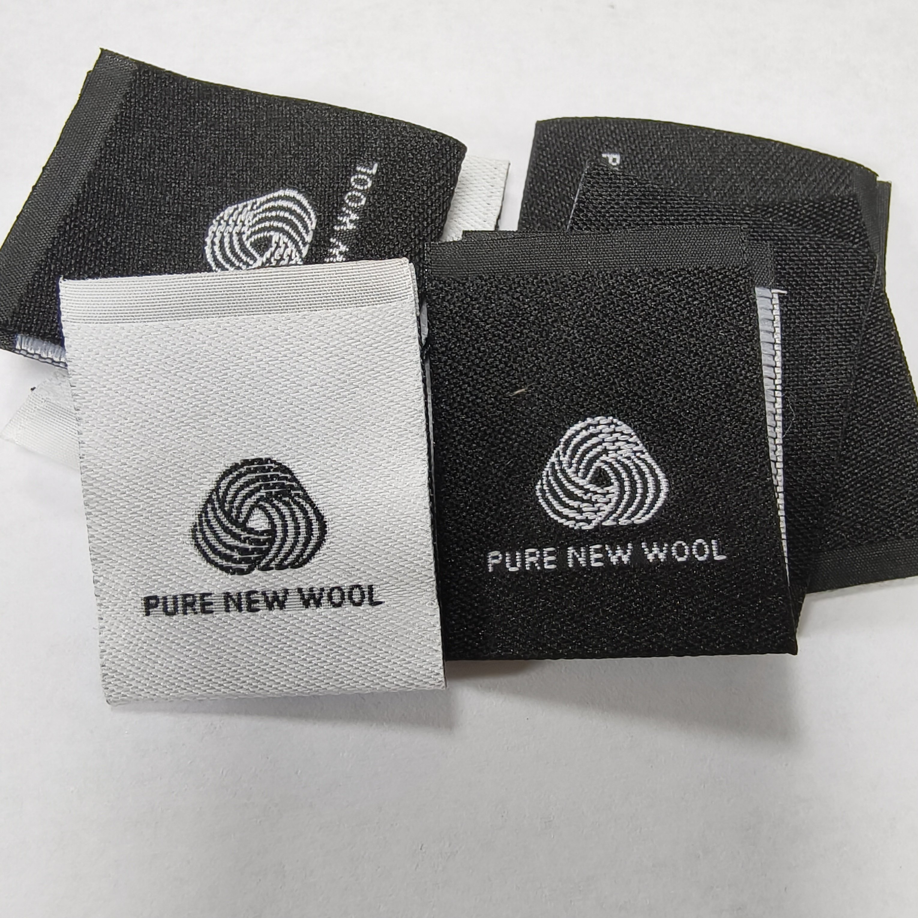 Wool Works Label 🌟 To improve the quality of wool coats, pure wool labels are essential