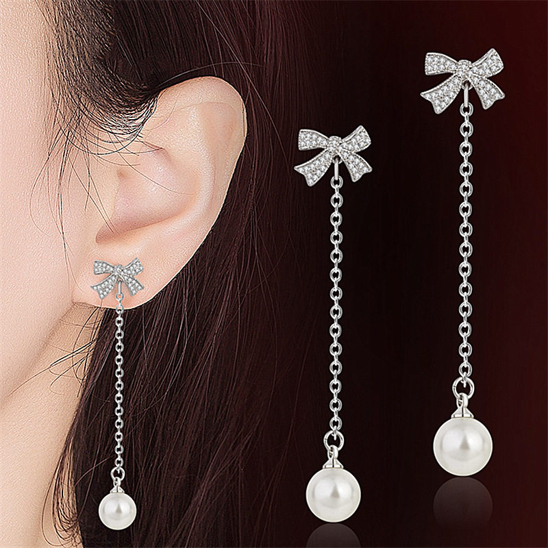 Ladies inlaid long version of the Su temperament pearl ear crash Korea with a butterfly bow ear nail pure silver needle
