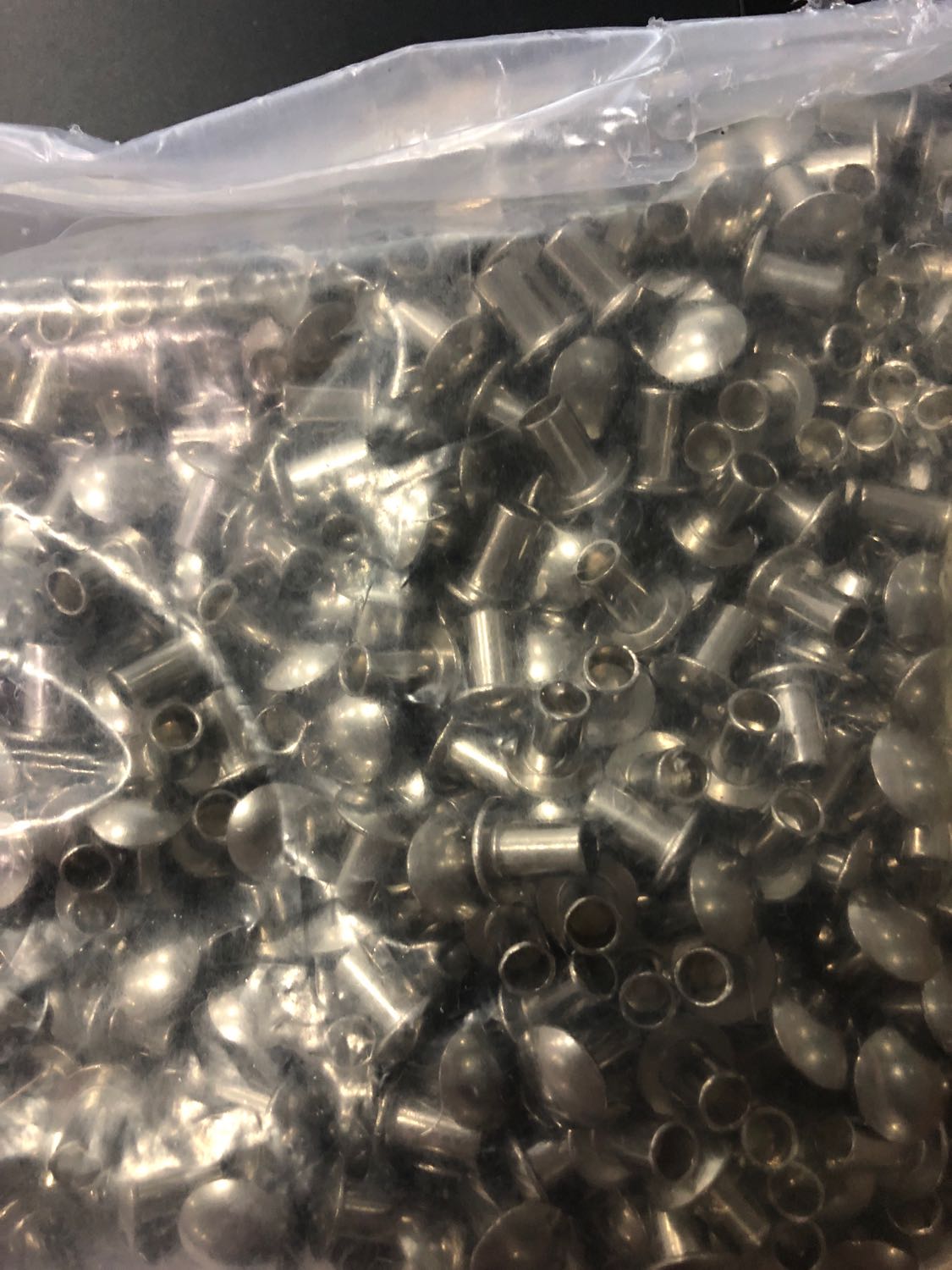 Flat round head half hollow rivet 5 * 6 long iron plated nickel RMB34  one thousand spot