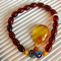 Putuoshan people put on the shelf after the Buddha beads bracelet blood with Jinpo pendant to protect the safety and health