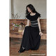 Ximeng 2024 ລະດູຮ້ອນໃຫມ່ອອກແບບຝຣັ່ງຂະຫນາດນ້ອຍ niche one-shoulder ສີດໍາ lazy style dress ສໍາລັບແມ່ຍິງ