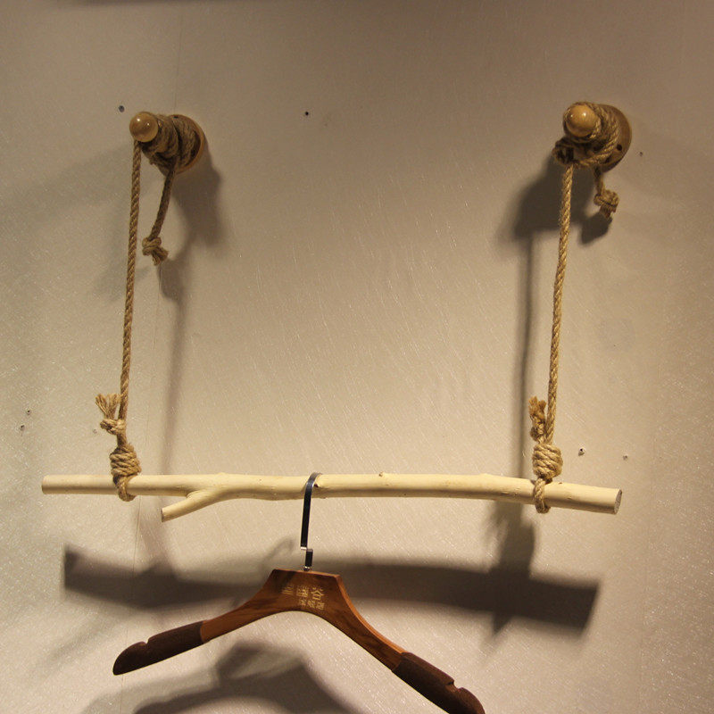 Natural branch pole clothing store is hanging hanger display rack Retro wall clothing rack Children's clothing store decoration props