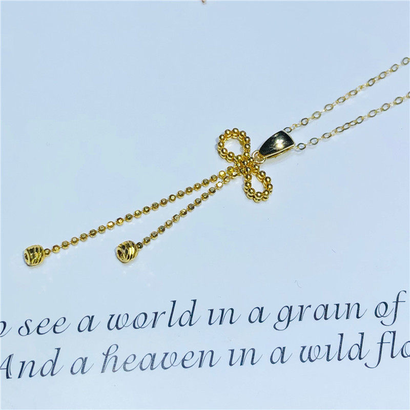 Butterfly knot 18K gold pure gold pendant pendant without chain bean chain bilayer solid texture design sweet and windy