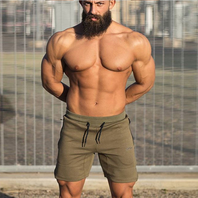 Cơ bắp tập thể dục captain america mùa hè thể thao quần short nam brother chạy đào tạo casual loose breathable phần mỏng năm quần quần thể thao dài
