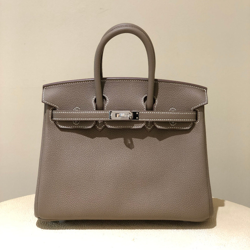 2025年消费升级潮下，雨森头层牛皮荔枝纹真皮铂金女包如何选？