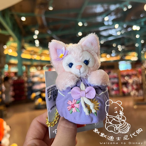 Шанхайский Диснейский поклонник по закупкам, улавливая звезда Del