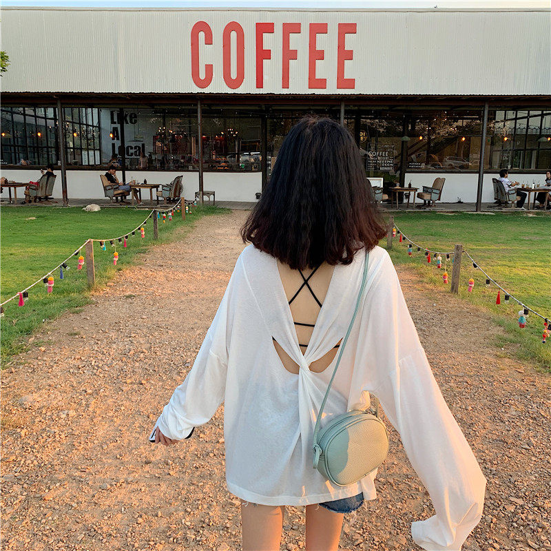 Seaside Vacation Woman with thin Bikini Shirt Swimsuit Outside Beach Surface Surface Surface
