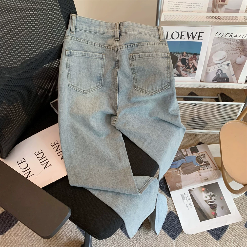Женские джинсы с заниженной талией и расклешенной бахромой вSpring-Summer, с фронтальным разрезом, крупной стежкой и необработанными краями, обтяжка и эластичность