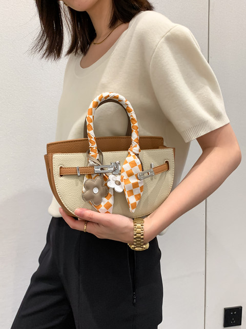 Dongsheng contrast color flower semicircle platinum bag 2022 new women's bag messenger one shoulder portable fashion tote bag