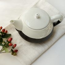 Southeast Yoo-style retro black and white ceramic small teapot handlebar small kettle heat and creative tea set tail