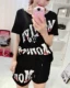 Bộ đồ thể thao nữ mùa hè 2018 thời trang mới phiên bản Hàn Quốc của áo len ngắn tay ngắn quần lửng ống rộng hai dây