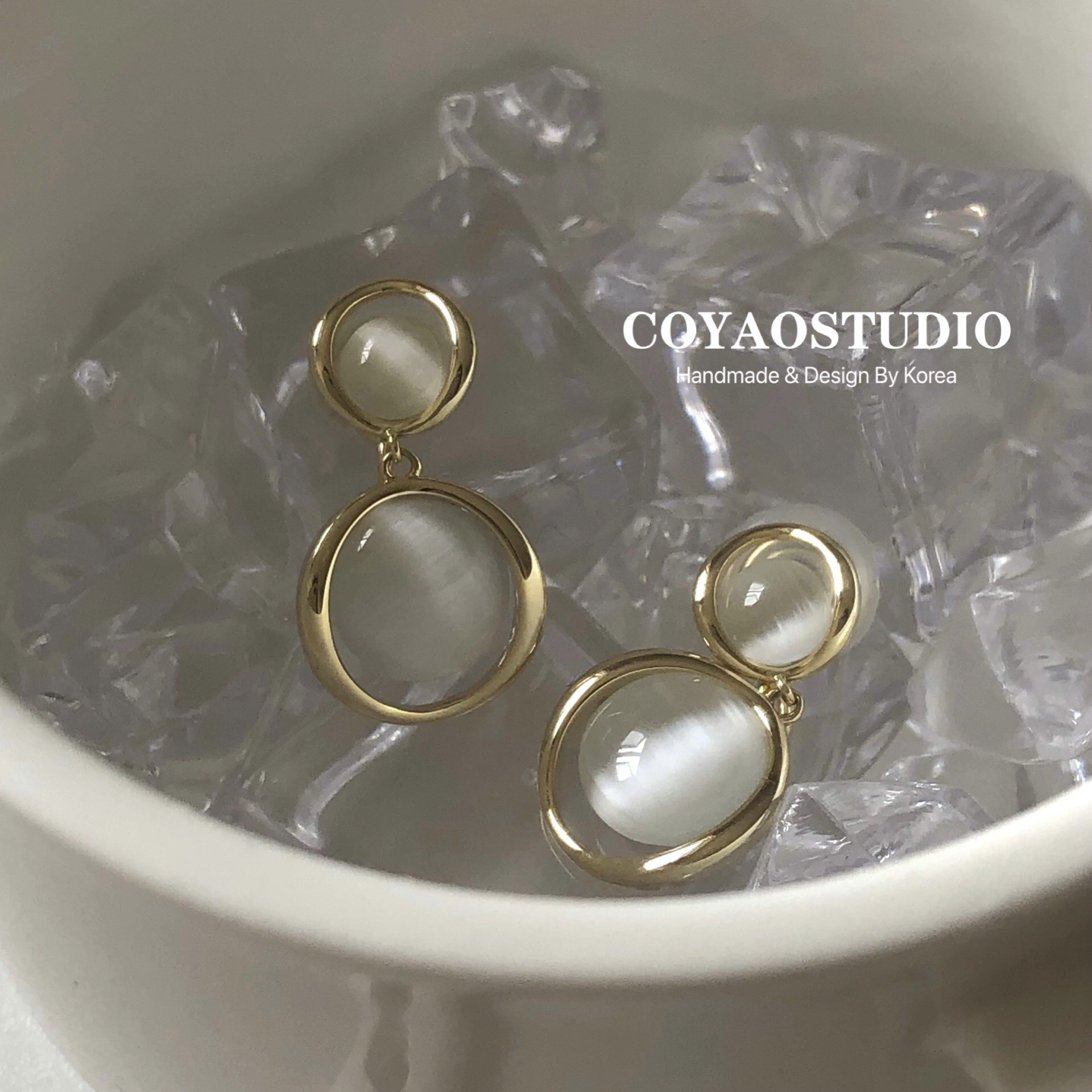 High-end mosquito coil ear clip women without ear piercing niche French retro opal design sense earrings tea light luxury