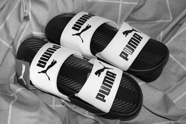 PUMA Hummer Popcat logo đen trắng đôi nam nữ dép thể thao giản dị 360265-10-12-01-25 dép uniqlo
