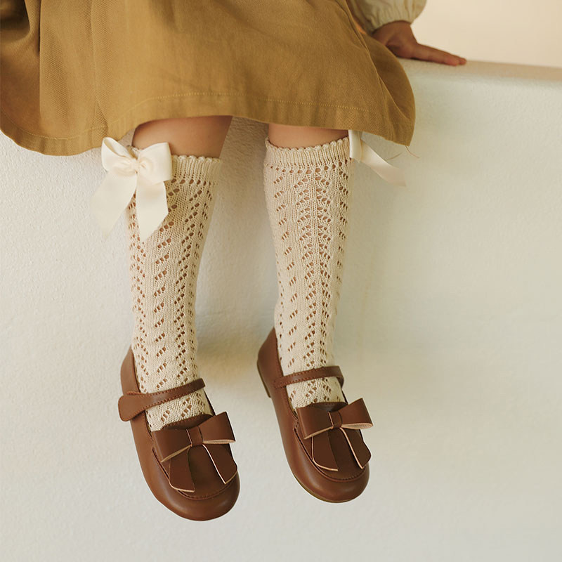 Young girl foreign style heavy industry middle tube socks new children's hollow lace bow stockings baby thin socks