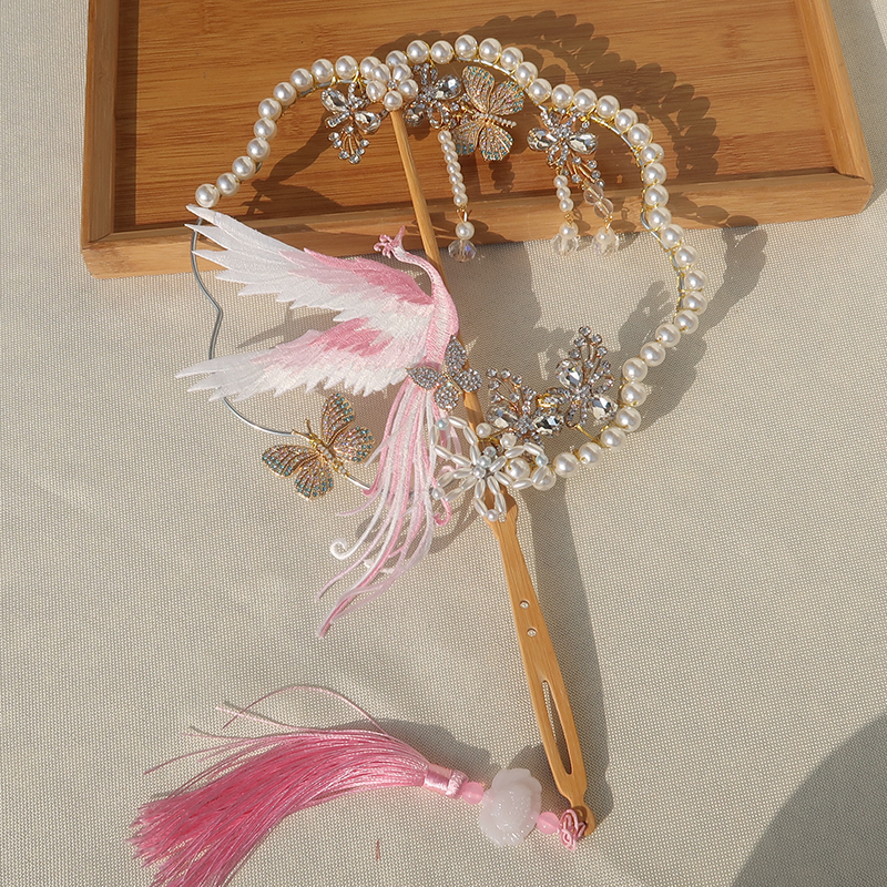 The original ancient air hollow pink crane fan Chinese clothing accessories bride wedding gift fan fan