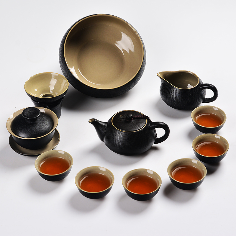 Black zen tea set suit Black ceramic kung fu tea set the whole household travel coarse pottery teapot teacup tureen gifts