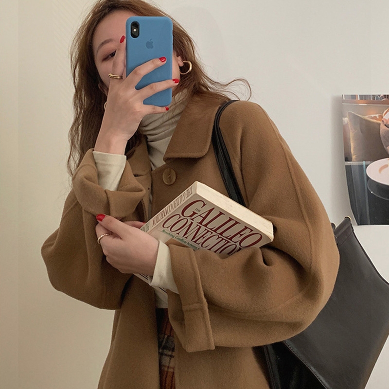 A camel coat girl in the long - term 2023 new temperament Han band band wide Sonie coat girl