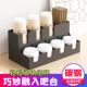 Disposable cup paper cup storage stand at the milk tea shop bar
