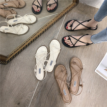 2021 new sandals womens summer flat bottom clip feet student Korean version wild seaside vacation Roman beach shoes fairy wind