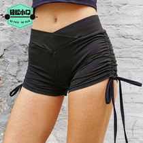 Sexy low waist drawstring strap peach hip sports shorts Womens elastic hips running yoga dancing steel pipe hot pants