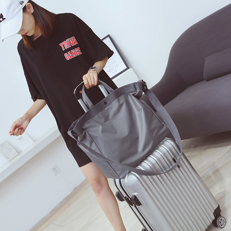 Túi du lịch màu đỏ nhỏ túi xách nữ phiên bản Hàn Quốc của thủy triều nhẹ du lịch khoảng cách ngắn công suất lớn có thể được đặt túi xe đẩy túi hành lý - Túi du lịch balo nam du lịch