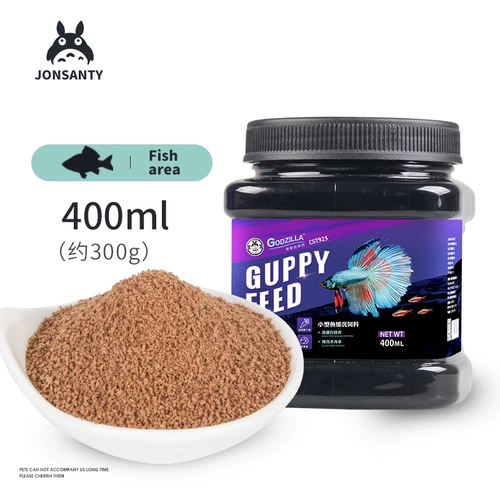 Живописная живописная павлинская рыба кормит тропические рыбы. Небольшая рыба кормила рыбу, рыба красный зеленый свет Микрогранты