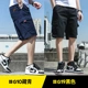 Quần short nam mùa hè Phong cách Hàn Quốc mặc bên ngoài thương hiệu quần thủy triều lỏng lẻo quần năm điểm overalls quần thể thao giản dị - Quần short