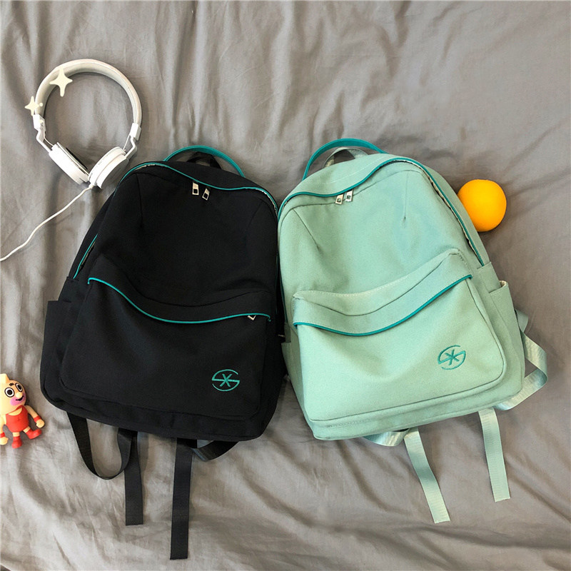 Brief elementary school boy's school bag boy minus light travel child 2-6 grade tutorial double shoulder bag female supplementary class