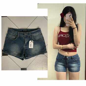 ເດັກຍິງຮ້ອນອາເມລິກາ retro ສັ້ນ denim distressed ສໍາລັບແມ່ຍິງ 2024 summer ການອອກແບບໃຫມ່ ແອວຕ່ໍາ slimming pants ຮ້ອນ